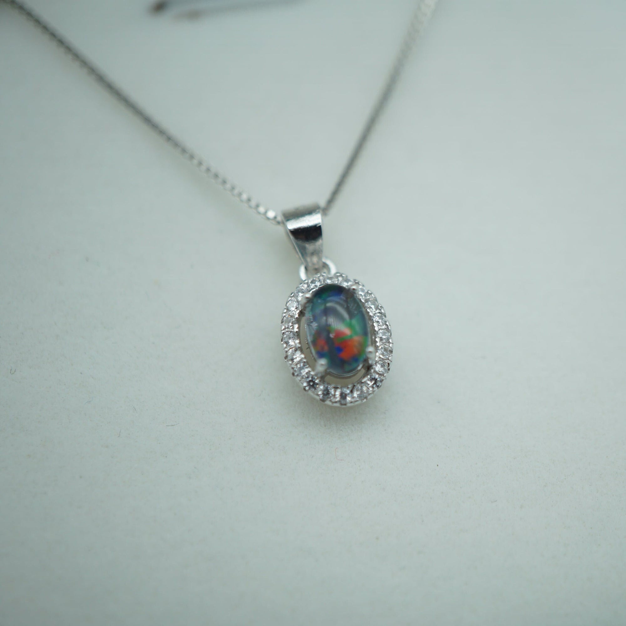 Silver halo style simple australian opal triplet set, necklace and earrings